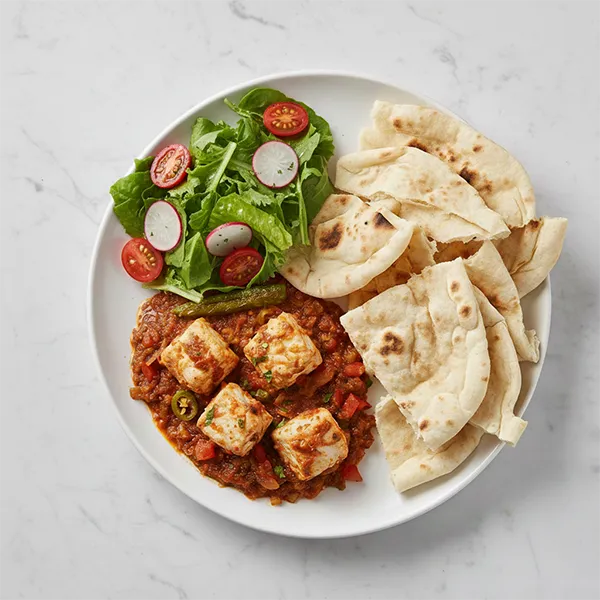 Omani fish keleya with saaj bread With Lettuce Salad